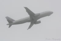 N408UA @ KSRQ - United Flight 1641 (N408UA) departs a foggy Sarasota-Bradenton International Airport enroute to Chicago-O'Hare International Airport - by Donten Photography