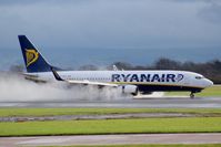 EI-EFO @ EGCC - heavy braking and full reverse thrust on a very wet runway 23r, - by Jez-UK