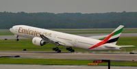 A6-EGC @ KIAD - EK232 to Dubai - by Steven Fernando