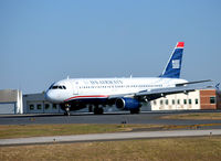 N637AW @ KCLT - Turning off runway CLT - by Ronald Barker