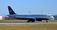 N637AW @ KCLT - Taxi to park CLT - by Ronald Barker