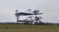 G-MAXV @ EGFH - Raven 1 (G-MAXV) leading Raven 3 (Vans RV-8 G-EGRV) in a formation take off from Runway 04. - by Roger Winser