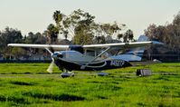 N450TP @ KRHV - Locally-based 2008 Cessna T206H taxing out for a VFR departure at Reid Hillview Airport, San Jose, CA. - by Chris Leipelt
