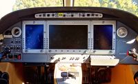 N277G @ KRHV - Wild Horses Aviation LLC (Whitefish, MT) Eclipse EA500 very nice cockpit at Reid Hillview Airport, San Jose, CA. - by Chris Leipelt