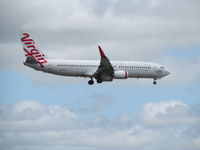 VH-YIQ @ NZAA - landing at AKL - by magnaman