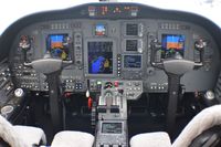 N99AG @ KOAK - Flight deck of N99AG. Aircraft is currently listed for sale.