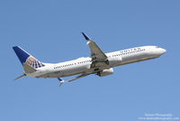 N38451 @ KSRQ - United Flight 1641 (N38451) departs Sarasota-Bradenton International Airport enroute to Chicago-O'Hare International Airport - by Donten Photography