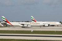 A6-ERP @ LMML - Emirates Airlines family A340 A6-ERP and A330 A6-ERV both in Malta - by Raymond Zammit