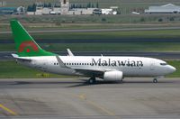 ET-ARB @ FAJS - B737 taxying out for its return flight to Malawi. - by FerryPNL