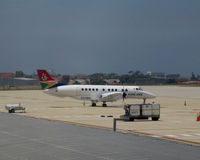 ZS-NRH @ FAPE - Taken from terminal building at Port Elizabeth - by Neil Henry