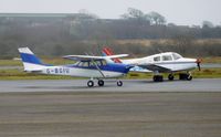 G-BGIU @ EGFH - Visiting Reims/Cessna F172H with resident Beech 19A aircraft G-AWTS  in the background. - by Roger Winser