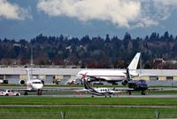 C-GTTD - At YVR with two Canadian Forces CC-144 Challengers,144617 (white) and 144614(black).ABX N767AX in background - by metricbolt