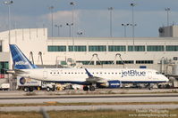 N279JB @ KRSW - JetBlue Flight 482 (N279JB) Indigo Blue sits on the ramp at Southwest Florida International Airport priort to a flight to Reagan National Airport - by Donten Photography