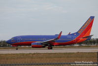 N281WN @ KRSW - Southwest Flight 491 (N281WN) 500th 737 arrives at Southwest Florida International Airport following flight from Canton-Akron Airport - by Donten Photography