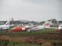 OO-TAQ @ EGTE - along with other stored a/c - by magnaman