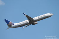 N75428 @ KSRQ - United Flight 1641 (N75428) departs Sarasota-Bradenton International Airport enroute to Chicago-O-Hare International Airport - by Donten Photography