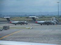 VH-TQM @ NZAA - With VH-SBI next to it. - by magnaman