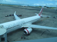 VH-YIE @ NZAA - On stand at AKL - by magnaman