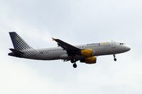 EC-HQL @ EGLL - Airbus A320-214 [1461] (Vueling Airlines) Home~G 06/07/2010. On approach 27L. - by Ray Barber