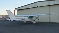 N7266S @ KRHV - Locally-based 1976 Cessna 182P parked in front of the Aerial Avionics hangar at Reid Hillview Airport, San Jose, CA. - by Chris Leipelt