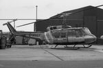 G-HUEY @ EGTC - Bell UH-1H Iroquois at Cranfield Airport July 1992. (Apologies for poor quality!) - by Malcolm Clarke