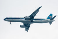 B-6628 @ VHHH - On finals for Hong Kong, inbound from Beijing Capital Int'l - by alanh
