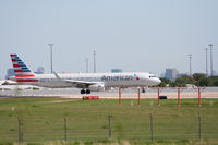 N129AA @ KDFW - AA 321 lines up for T/O. - by Darryl Roach