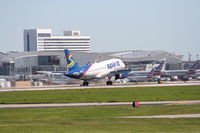 N521NK @ KDFW - NKS 319 touches down 18R. - by Darryl Roach