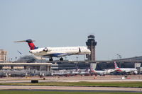 N812SK @ KDFW - SKW CRJ touches down 18R. - by Darryl Roach