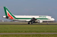 EI-IKF @ EHAM - Alitalia A320 decelerating. - by FerryPNL