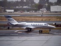 N504PS @ KSNA - Cessna 525B taxing by for takeoff. - by Eric Olsen