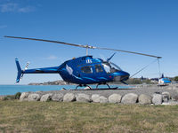 ZK-IXL @ NZKI - Off airport, near Kaikoura Helicopters lot on the Kaikoura coast - their R44 ZK-HLE in the background - by alanh