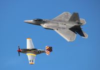 02-4039 @ LAL - F-22 Raptor with P-51D