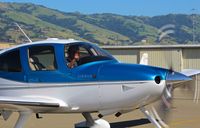 N448TT @ KRHV - Locally-based 2008 Cirrus SR22 G3 Turbo taxing out for a VFR departure at Reid Hillview Airport, San Jose, CA. Thanks for the wave!  - by Chris Leipelt