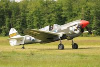 F-AZKU @ LFFQ - Curtiss P-40N Warhawk, Taxiing to parking area, La Ferté-Alais (LFFQ) Air show 2015 - by Yves-Q