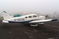 G-KEVB @ EGTR - Taken on a quiet cold and foggy day. With thanks to Elstree control tower who granted me authority to take photographs on the aerodrome. Previously N9289E. Owned by Palmair Ltd. - by Glyn Charles Jones