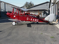 N60MZ @ SZP - Locally-based 1930 deHavilland DH-60G Gypsy Moth in red and silver color scheme and carrying U.S. and British registrations (NX60MZ and G-AAMZ) @ Santa Paula Airport, CA - by Steve Nation