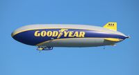 N1A - Goodyear Air Ship in flight over Ponce Inlet near New Smyrna Beach - by Florida Metal