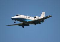 N2 @ MCO - FAA Cessna Excel - by Florida Metal