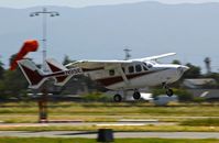 N9SE @ KRHV - Vanaduim Services LLC (Las Vegas, NV) 1974 Cessna T337G departing runway 31R at Reid Hillview Airport, San Jose, CA. - by Chris Leipelt