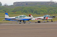 G-WMTM @ EGFH - Tiger, Biggin Hill based, previously N4517V, seen parked up with Monsun G-AYPE. - by Derek Flewin