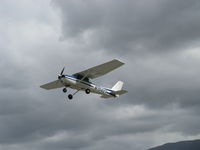 N704UT @ SZP - 1976 Cessna 150M, Continental O-200 100 Hp, takeoff climb Rwy 22, doing pattern work today - by Doug Robertson