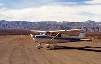 N6369E @ L09 - 69E at Stovepipe Wells with the striking Panamint mountains as a backdrop. Runway is seen on the left.