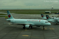C-FLSS @ CYVR - Taxiing in to domestic - by Remi Farvacque