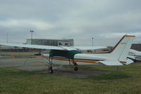 N6415R @ KHAO - Sitting on the ramp on a miserable winter day - by Floyd Taber