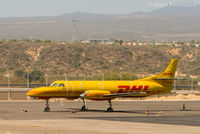 XA-SUS @ MMSD - Parked at north end of apron. Flights operated for DHL. - by Remi Farvacque