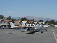 N222EN @ SZP - 1977 Beech F33A BONANZA, Continental IO-520 285 Hp, long cabin 19 inch extension, taxi to transient ramp - by Doug Robertson