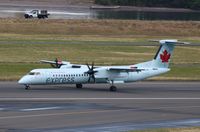 C-GVJZ @ KPDX - DHC-8-402