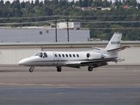 N561WF @ KBFI - Cessna 560 taxing in after landing. - by Eric Olsen