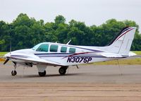 N3075P @ KDTN - At Downtown Shreveport. With leaves on the trees. - by paulp